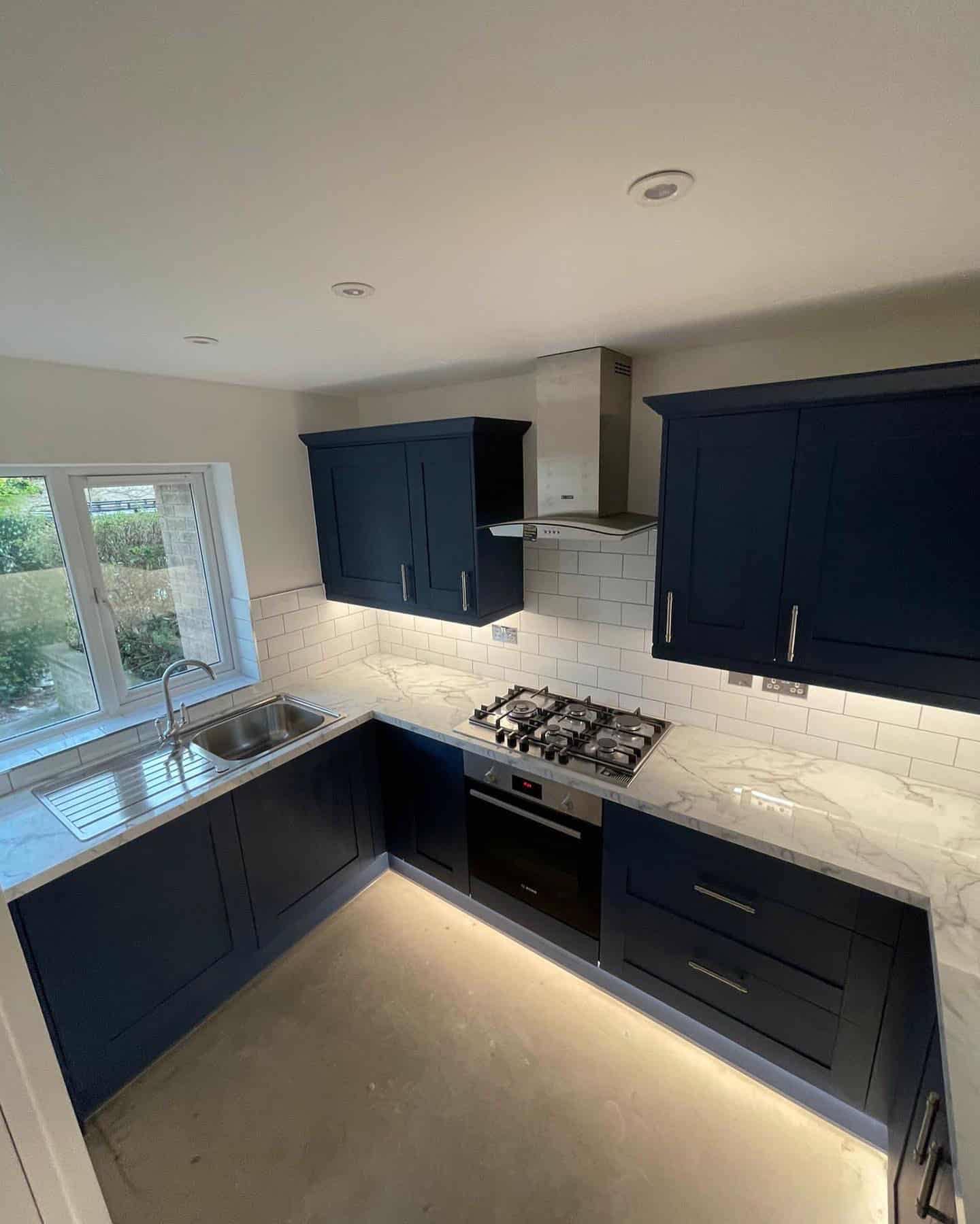 Navy Cabinet Kitchen - Kitchen Remodel project by Emperor Renovations in Philadelphia